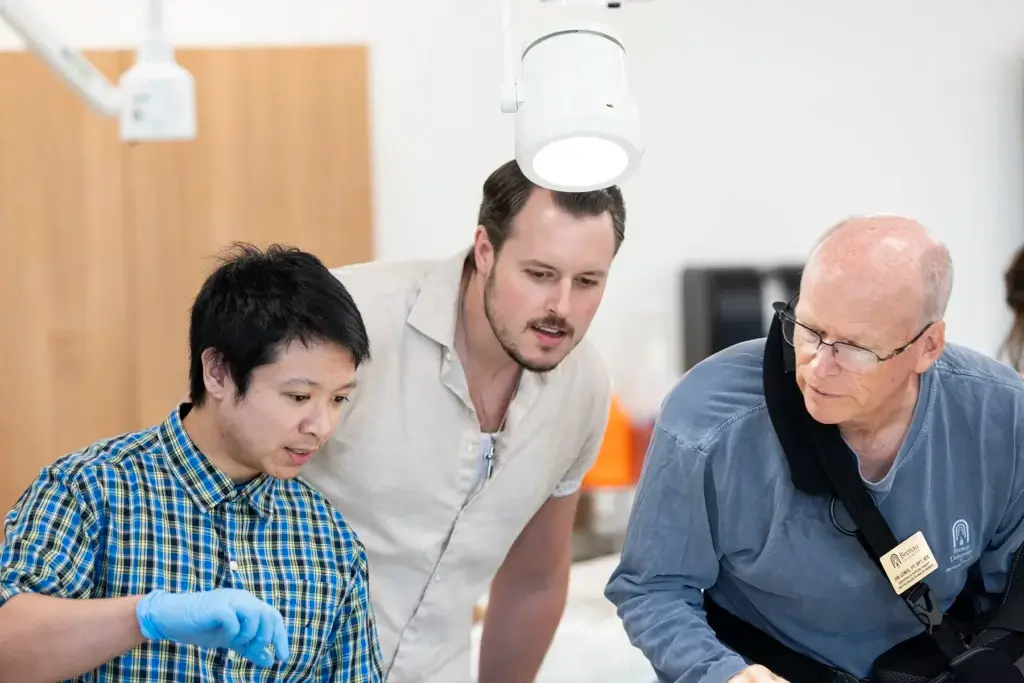 Students and professor work collaboratively